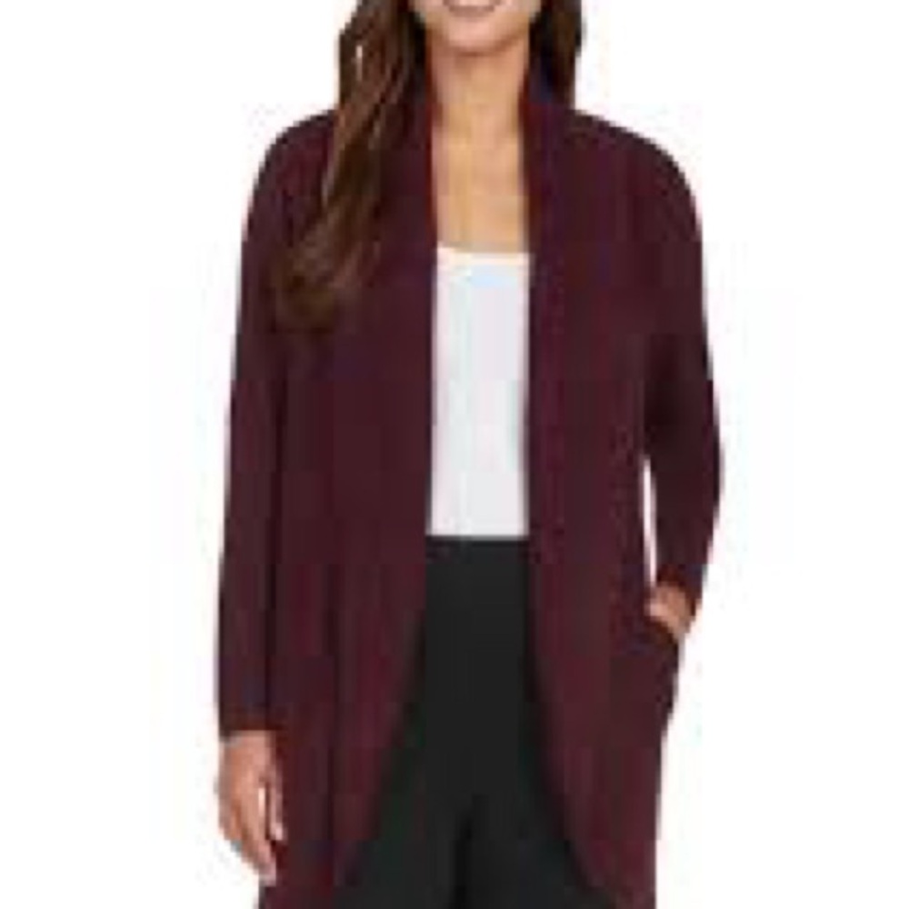 Burgundy Cardigan. Beautiful color. Relaxed fit XS but runs a little big.